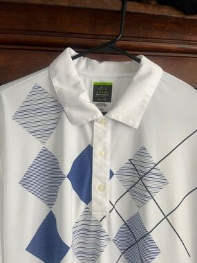 Greg Norman Collection White Polo with Blue Geometric Diamond Pattern